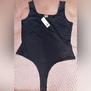 Francesca’s Boutique Blue Rain Black Thong Bodysuit
Nylon / Spandex blend
Large